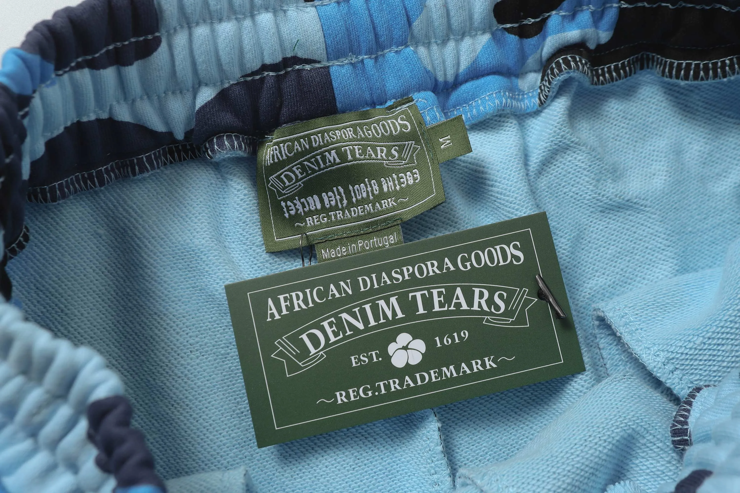 8208# DENIM TEARS Kapok European and American trendy brand high-quality foam flocking camouflage printed shorts Color Camouflage blue Camouflage powder Camouflage gray Camouflage apricot Camouflage green Size S-XL